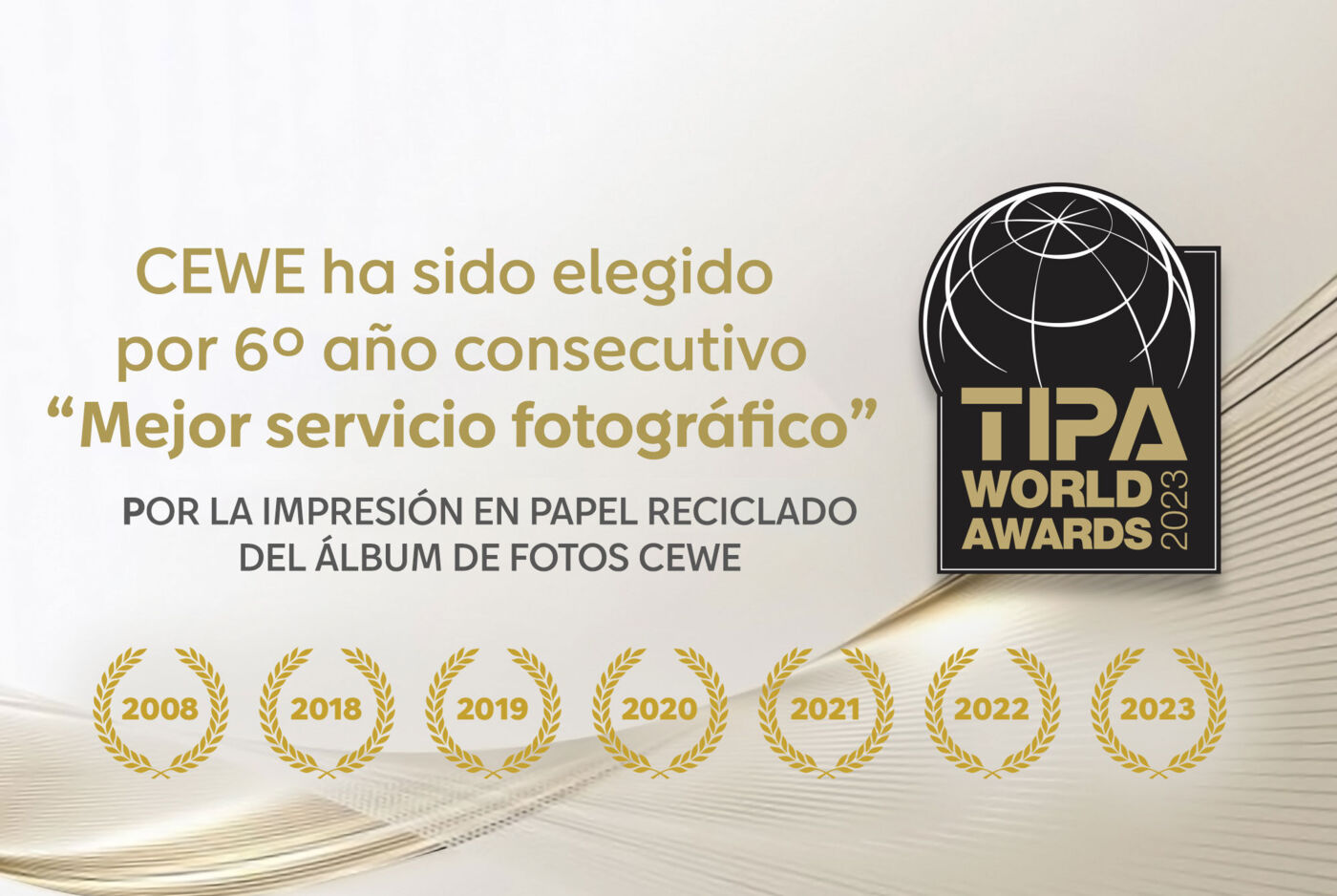Premio TIPA "mejor álbum de fotos" por el papel 100% reciclado.