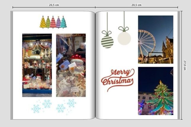 Una doble página festiva de un álbum CEWE con árbol de Navidad y decoración.