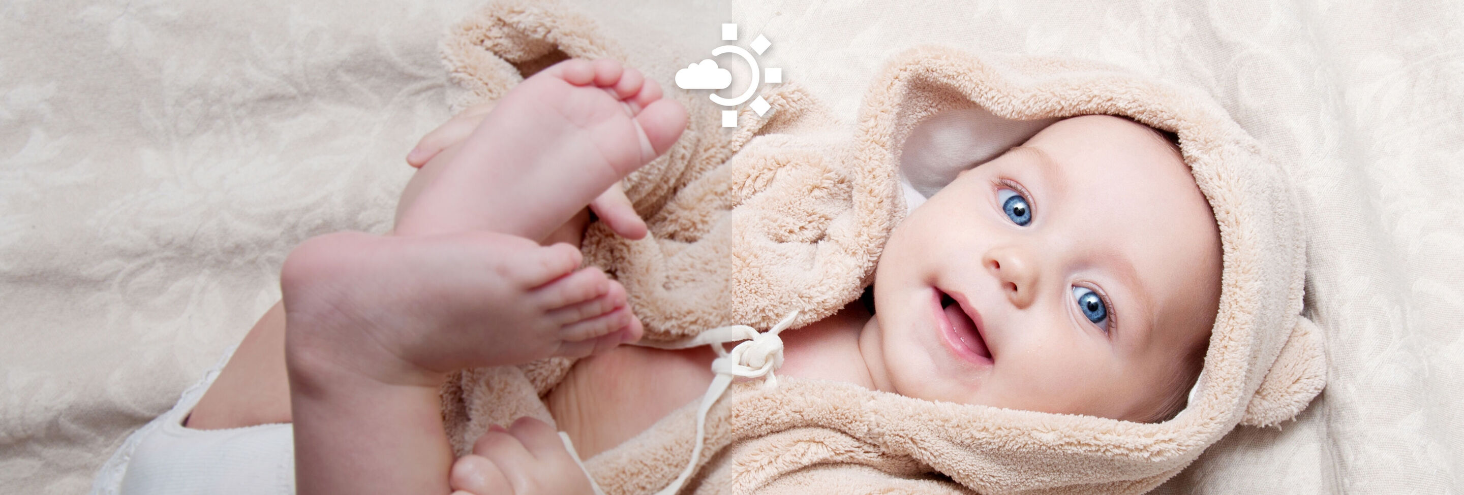 Un bebé durmiendo en una manta suave, acurrucado en una toalla clara y suave.