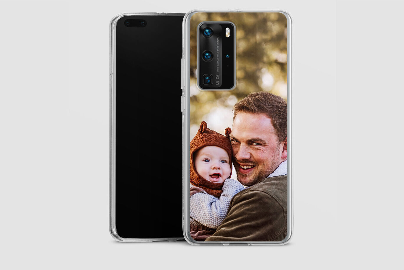 Una selfie cariñosa de un padre sosteniendo a su hijo y apoyando su cabeza.