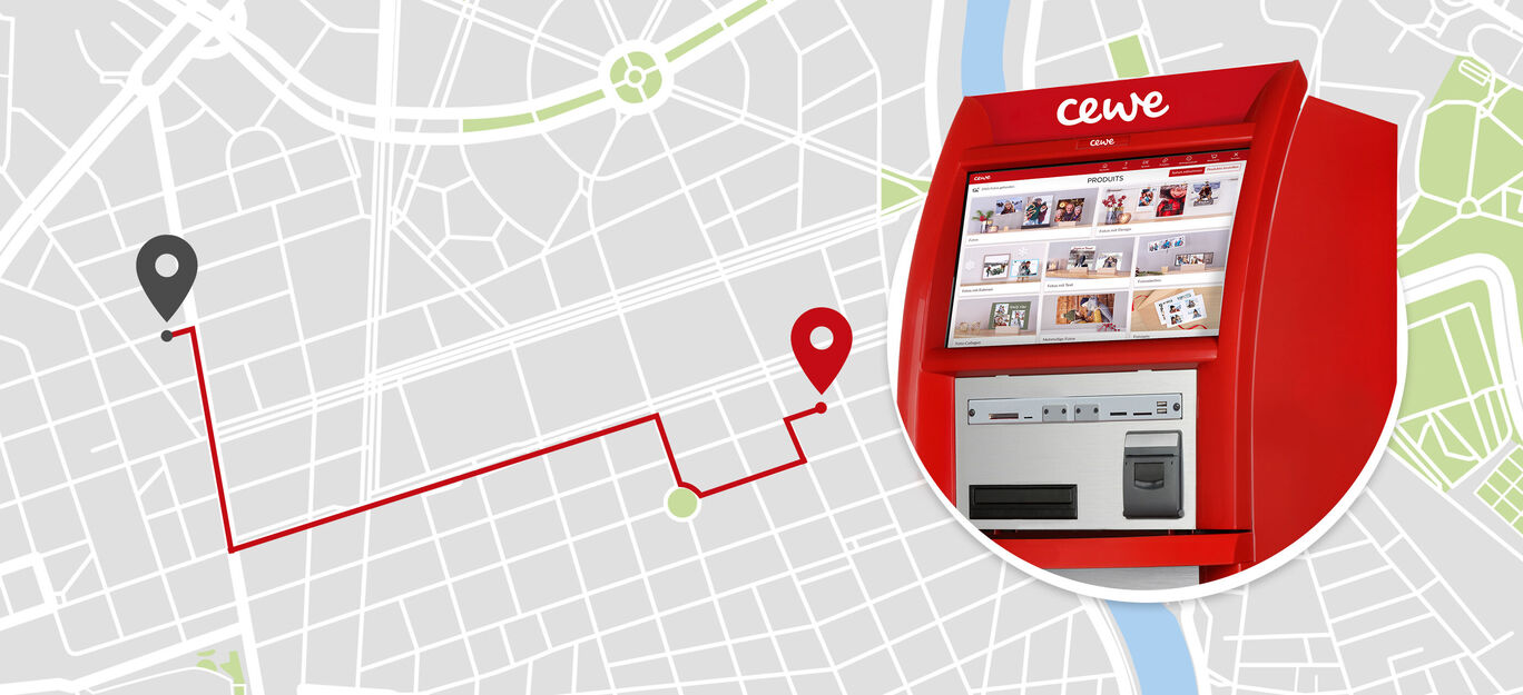 Una CEWE Fotobox en un mapa de ciudad muestra el camino a un fotomatón.