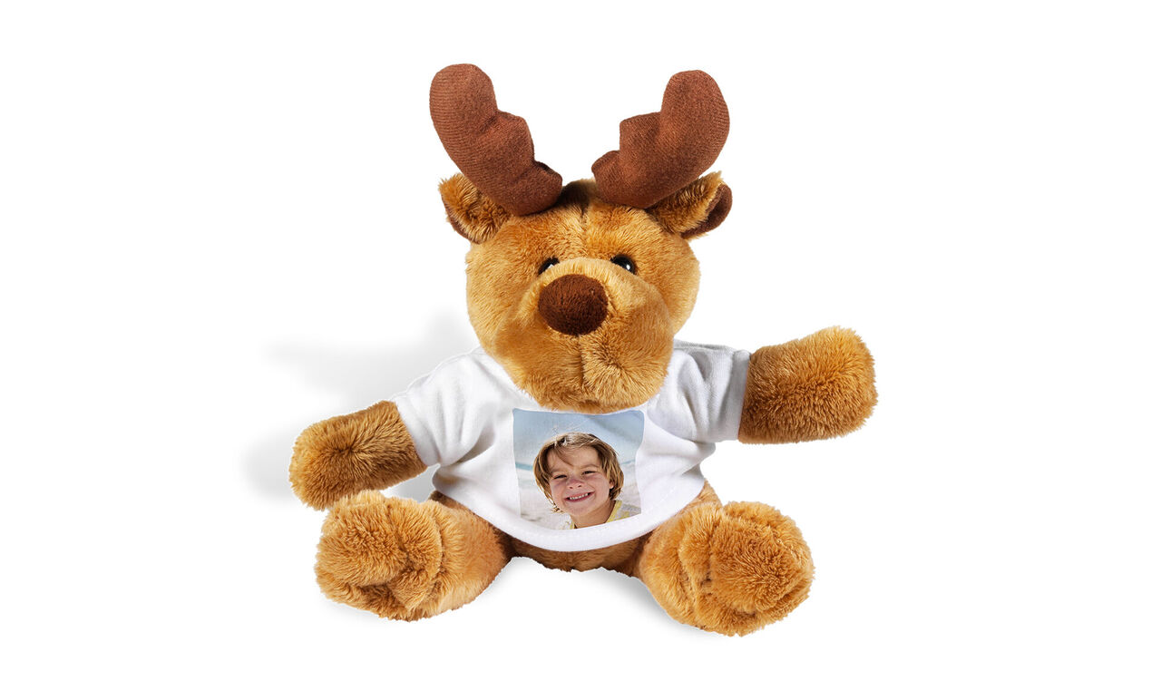Reno de peluche personalizado con foto de un niño.
