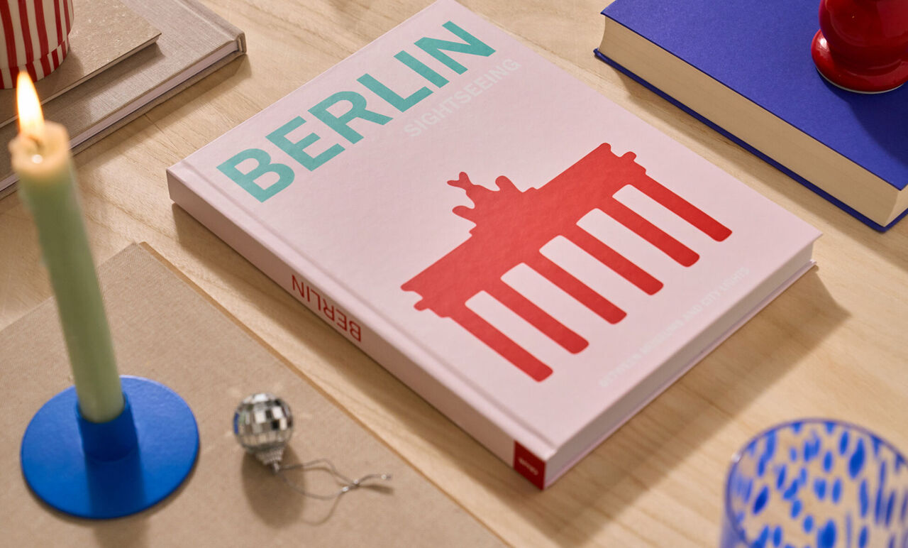 Álbum de fotos de la colección de viajes con el título «Berlín» en la portada.