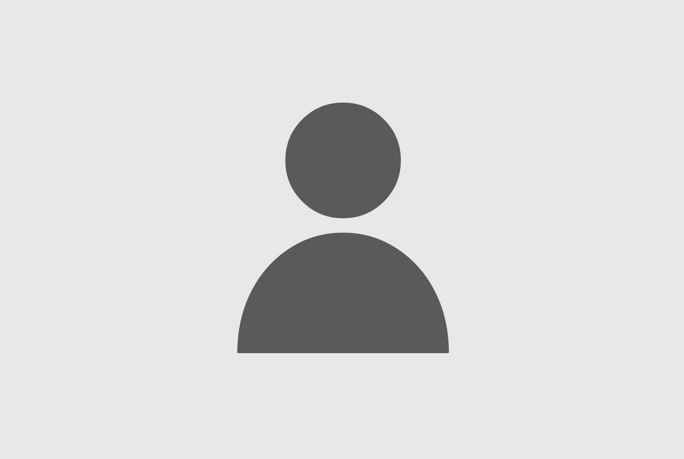 Silueta gris de una persona sobre un fondo neutro.