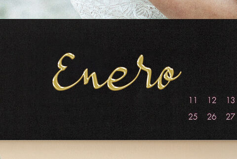 Hoja del calendario para enero con la palabra 'Enero' en letras doradas.