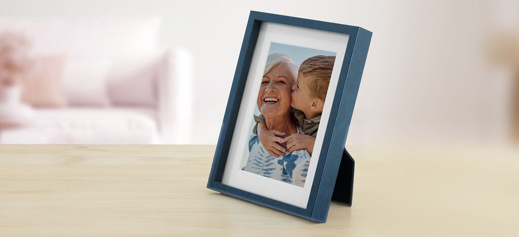 Un marco de fotos Cariñoso con una foto en el interior.