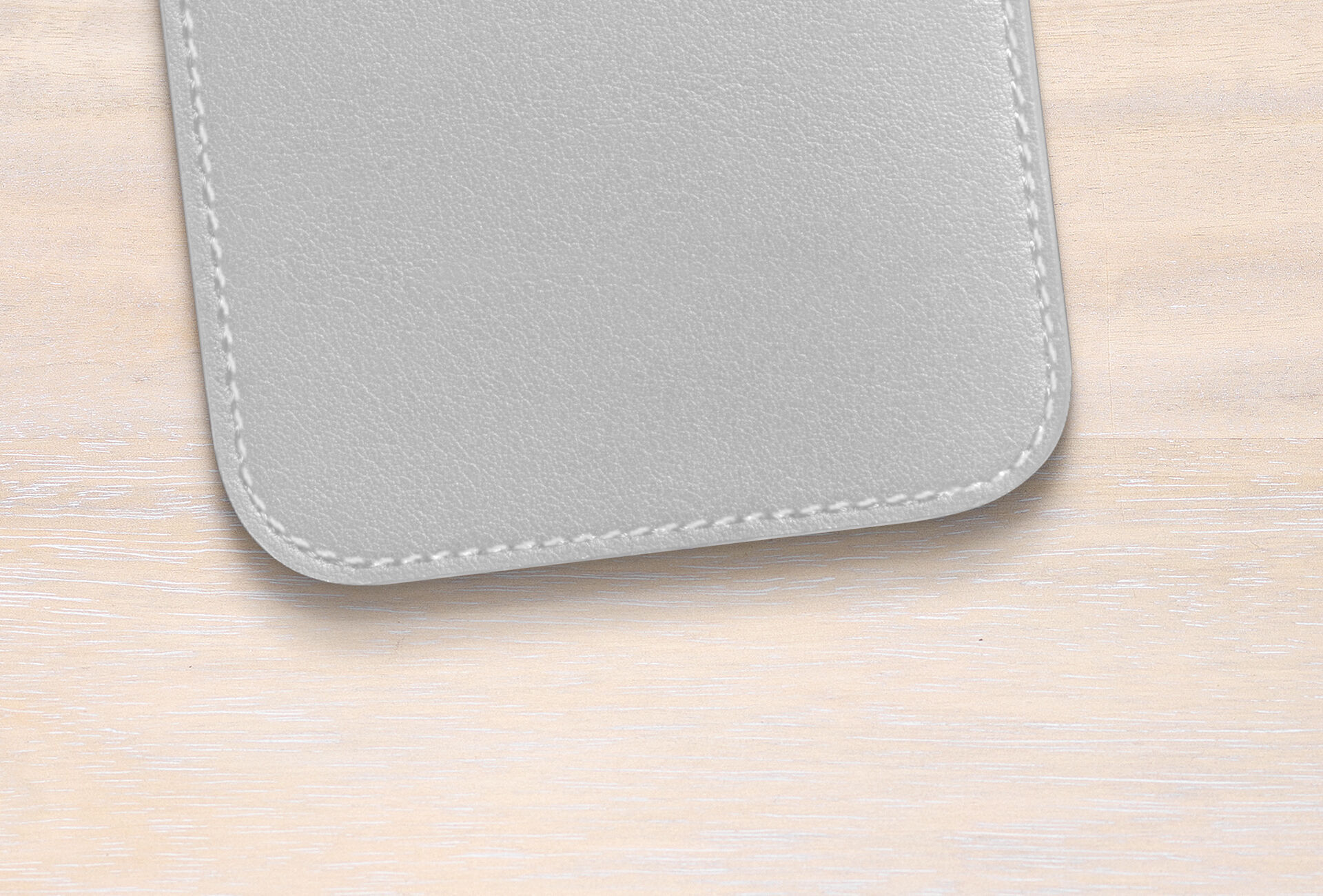 Superficie de cuero gris de CEWE sobre madera clara