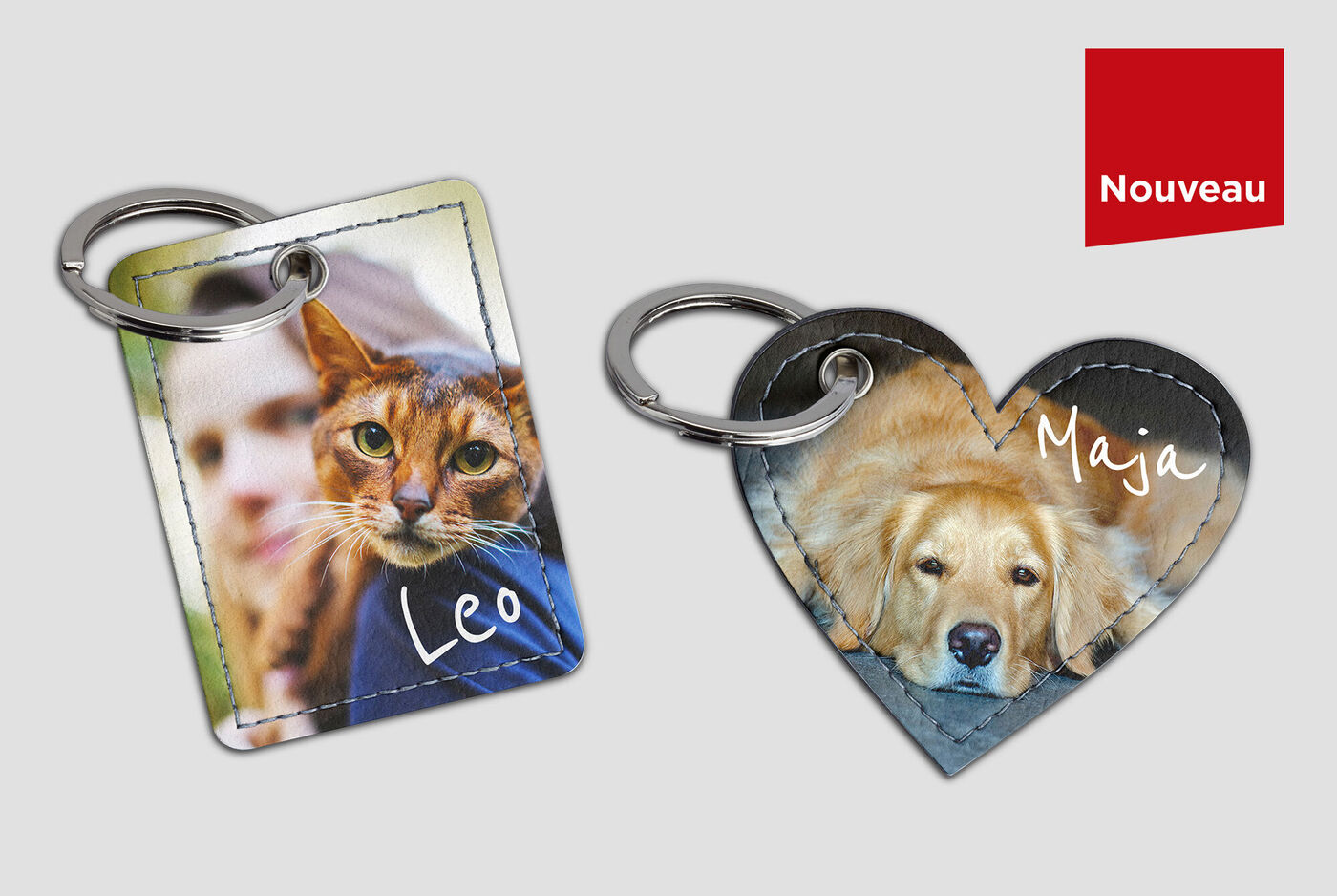 Dos llaveros personalizados, uno con la foto de un gato y nombre y el otro en forma de corazón con un perro y nombre.