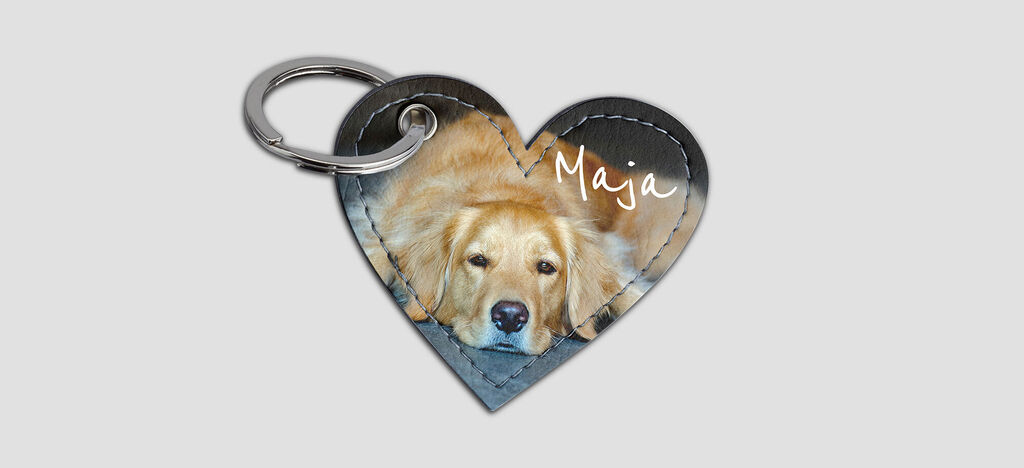 Llaveros en forma de corazón con el nombre Maja y un motivo de animal.